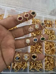 Golden rings with a variety of colored gemstones