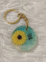 Circular Sunflower Resin Keychain.
