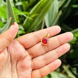 Gold plated round type big, beautiful pendant with red, white, purple color stone for women and girl