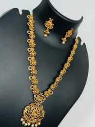 Dull Gold color very beautiful Engraving trangl design long necklace and jimikky earring with gold, color stone and white pearl for women and girl