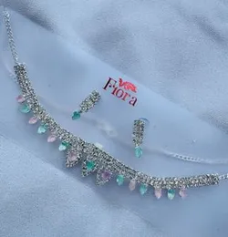 Silver color beautiful rich look necklace with light pink and light green stone for women and girl