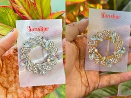 Gold and silver color beautiful leaf design round saree brooch with white stone for women