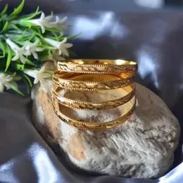 gold plated kids bangels.