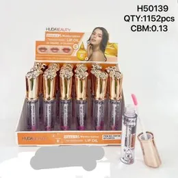 Huda Beauty LIP OIL 24 HOURS LIP TREATMENT Vitamin