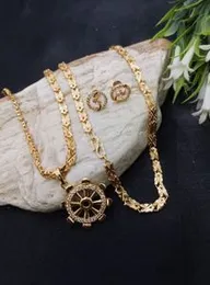 gold plated stylish rich look 4mm Singapore chain with dharma chakra stone pendant for stylish womens.