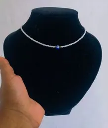 Evil eye see beat necklace.