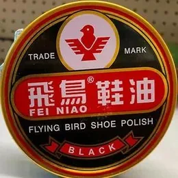Flying Bird black Shoe Polish.