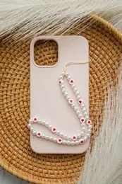 Phone chain Red heart charm with white .