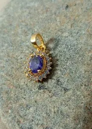 gold plated stone pendant