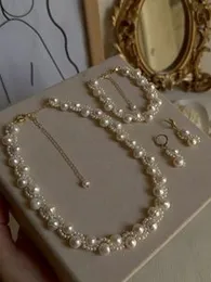 Party  wear pearl jewellery set beaten esthetic.