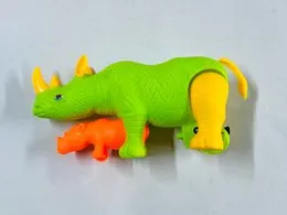 A Green Rhinoceros with an Orange Baby Rhinoceros Toy for Children