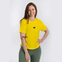 casual outfit featuring  T-shirt with a small crown print