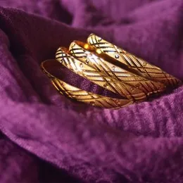 GOLD PLATED BANGLES.