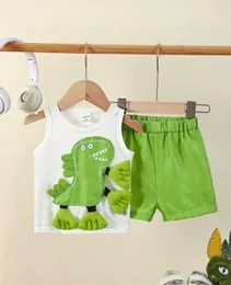 children's sleeveless vest and shorts set featuring a green dinosaur applique.