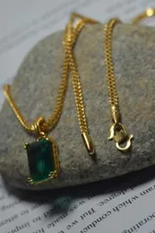 1.9mm fox singapore chain with green stone pendant.