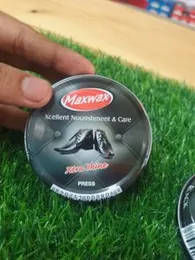 Maxwax Xcellent Nourishment & Care Xtra Shine Shoe Polish.