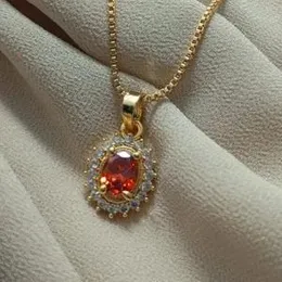 gold plated 1mm box chain with pendant.