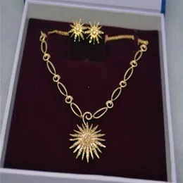 Gold plated Elegant Sun flower neckless with  new design Sun flower  earring.