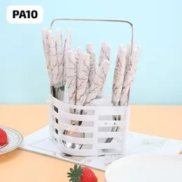 24-piece luxury cutlery set with a marbled design, presented in a white holde