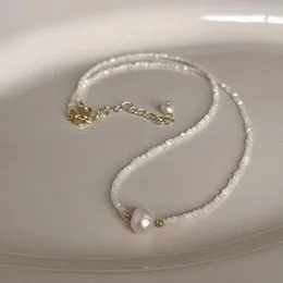 White pearl beat necklace.