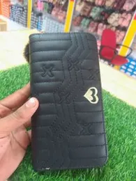 quilted wallet or clutch purse.