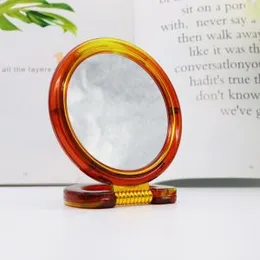 Double Sided One Side Regular One Side Magnifying mirror.