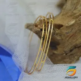 Gold plated Two line Charm Bangle Stylish Rich Look Guaranteed With Stone For Women,.