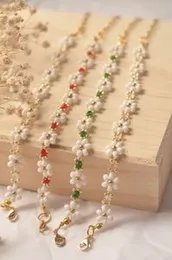 Lil flowers white decor with colours ~ Hand bracelets.