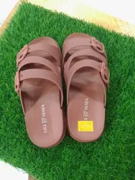 pair of Lily & Maya branded slippers.