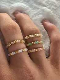 Beat rings  White with gold  Pink with gold  Green with gold