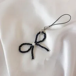 Small Black bow Phone cover keychain 
