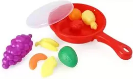 kids toy frying pan with vegetables
