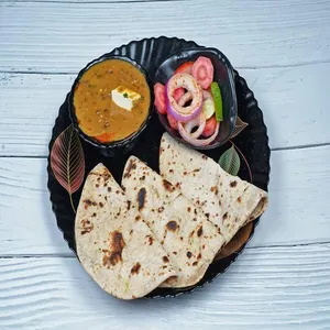 Dal Makhni (300 ML) with 3 Butter Roti