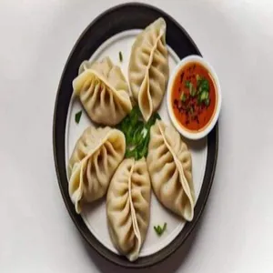 Veg Momos (8Pcs)