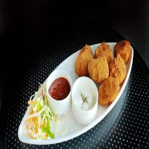 Veg Crunchy (kurkure) Momos [8 Pieces]