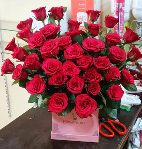 Red Roses in Pink Box
