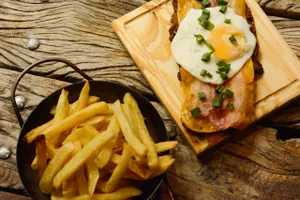 Mila piola con papas fritas