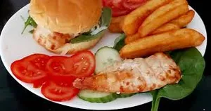 Burger with chips and salad