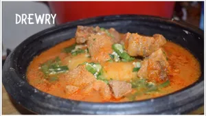 Fufu with Groundnut Soup – Goat meat, Fresh Fish & Intestine