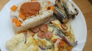 Oil Rice with egg,gizzard and sardine