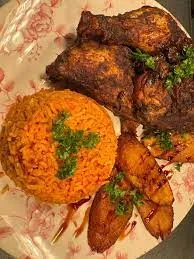 Charcoal chicken with jollof