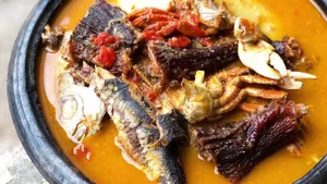 Fufu with light soup (akosombo fish)