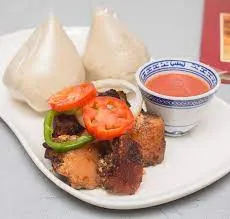 Banku and grilled pork