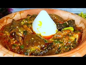 banku with okro stew[ cowfeet and wele ]