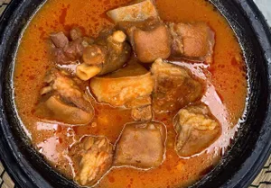 Fufu with Goat light soup and intestines