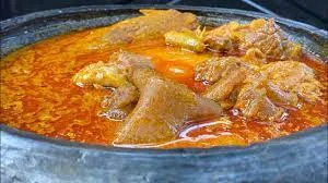 Fufu with Palm nut Soup – caw meat, Tuna & Intestine