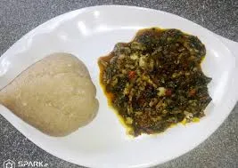 Eba with bitter leaf soup