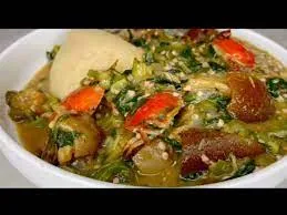 Banku with okro soup and Goat meat