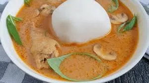 Rice Ball with groundnut soup (cow feet, welle