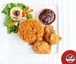 Jollof with vegetable sauce